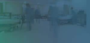 blurry picture of nurses walking in a hospital room